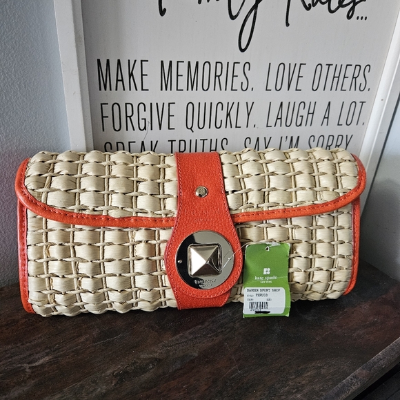 kate spade Handbags - Kate Spade Ava Woven Straw Clutch with Orange Trim NWT